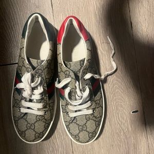 These are gucci shoes for boys . Red , green , Cream. In good condition.